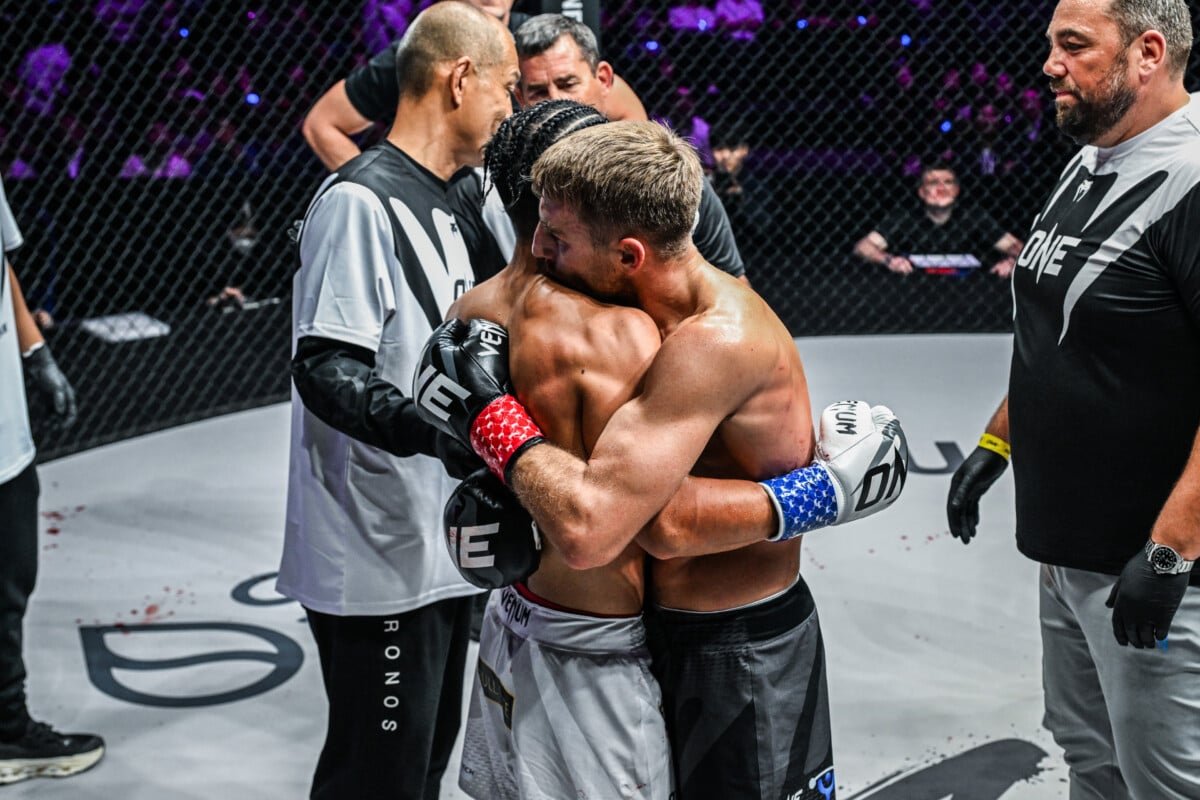 Jonathan Haggerty hugs Hiroki Akimoto after their World Title battle at ONE SAMURAI 4.