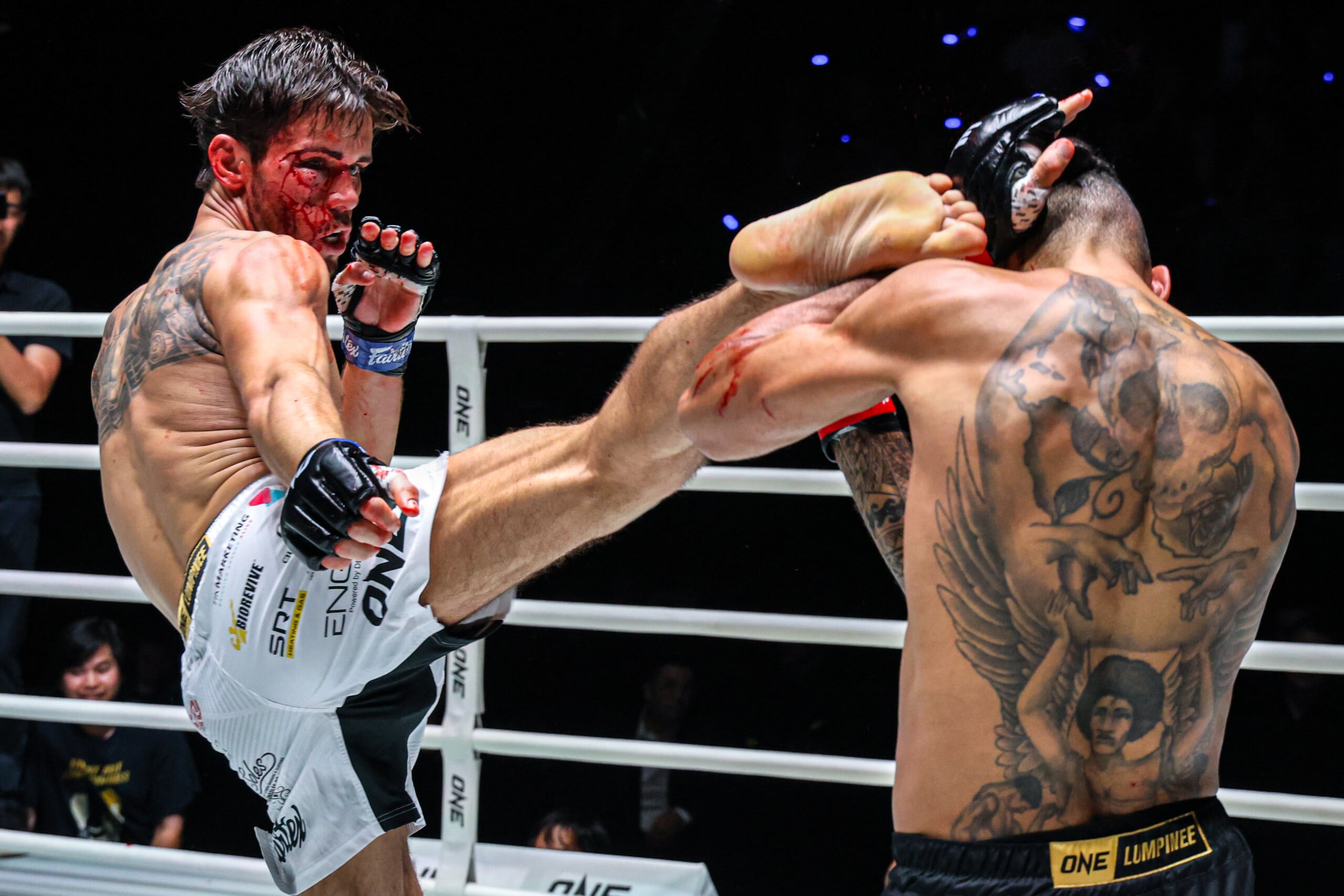 George Jarvis throws a high kick on Regian Eersel at The Inner Circle 33.