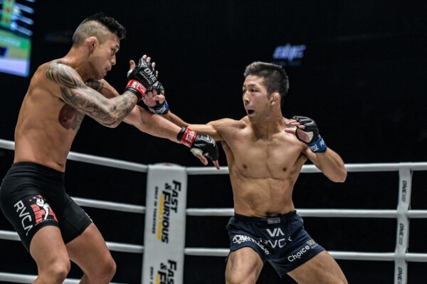Koyomi Matsushima throws his right hand at Martin Nguyen.