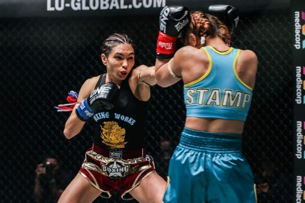 ONE Atomweight Kickboxing World Champion Janet Todd punches Stamp Fairtex