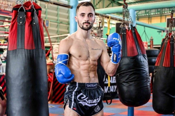 Jake Peacock posing at PK Saenchai Muaythaigym