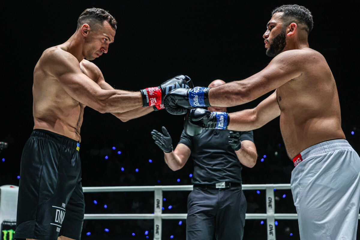 Samet Agdeve and Roman Kryklia touch gloves