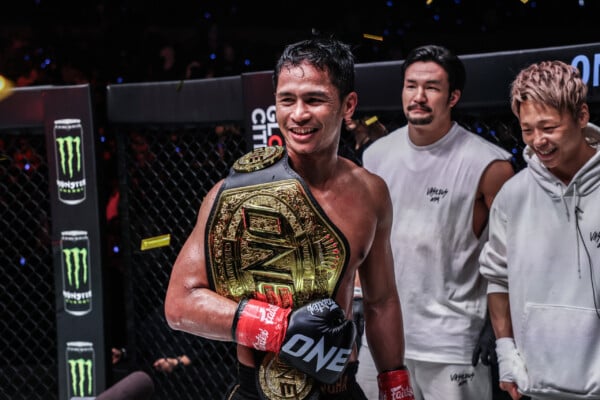 Superbon celebrates after defeating Masaaki Noiri at ONE 173.