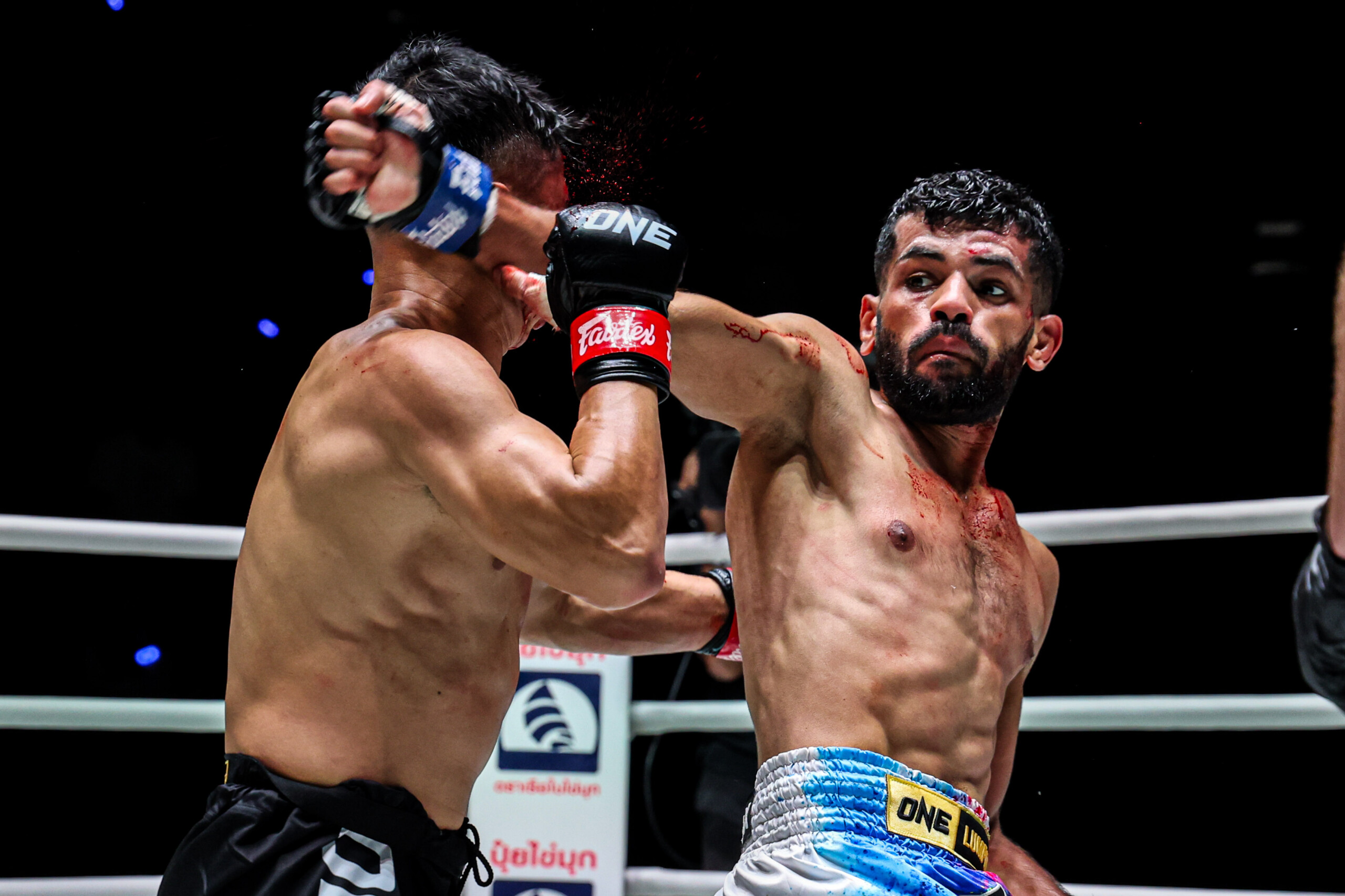Akram Hamidi lands a spinning attack on Watcharaphon Laochokcharoen at ONE Friday Fights 164.