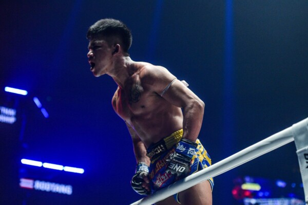 Rodtang Jitmuangnon celebrates on the ropes in his Muay Thai World Title bout in Manila.