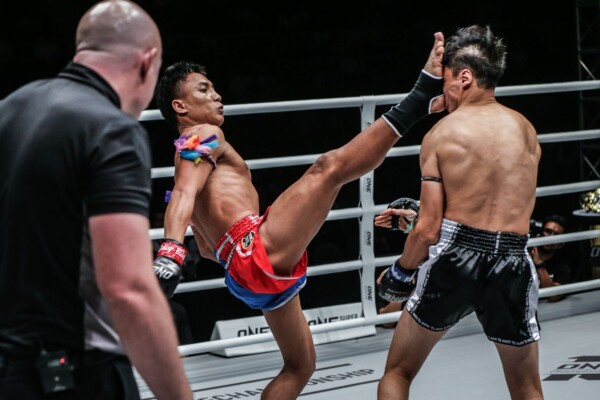 Thaiand's Mongkolpetch push kicks Italy's Joseph Lasiri in the face