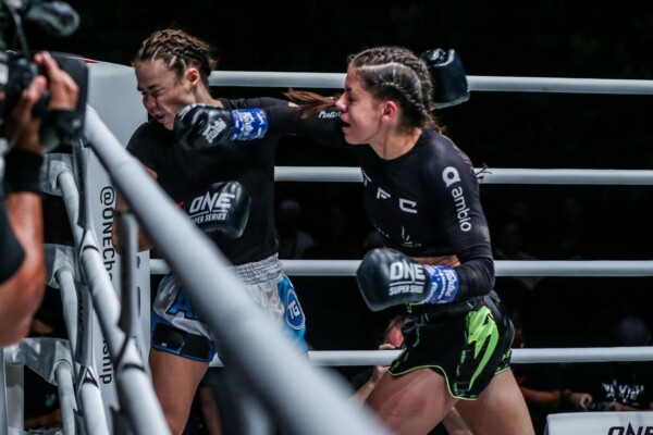 Slovakia's Viktoria Lipianska connects with a right cross on Britain's Amber Kitchen