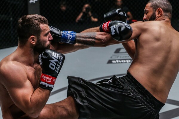 Romanian striker Andrei Stoica trades leather with Brazil's Anderson Silva