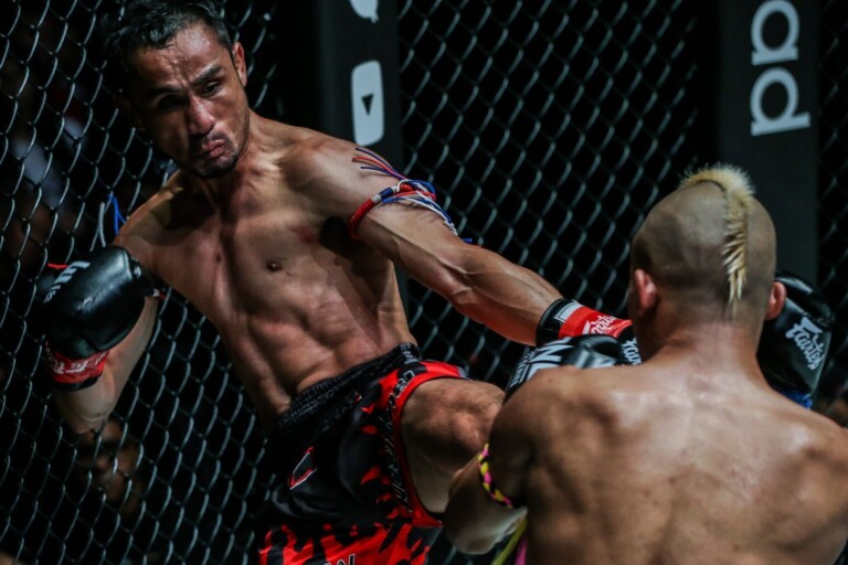 Thai legend Sam-A Gaiyanghadao competes against Chinese striker Wang Junguang in the main event