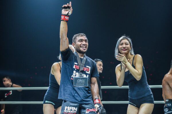 Indonesian MMA fighter Abro 'The Black Komodo' Fernandes with the winner's medal