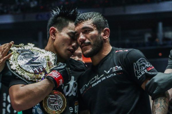 ONE Strawweight World Champion Joshua Pacio and Alex Silva embrace