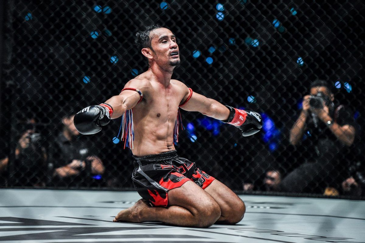 ONE Strawweight Kickboxing World Champion Sam-A Gaiyanghadao celebrates his win against Wang Junguang