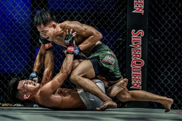 Stefer Rahardian strikes Adrian Mattheis on the ground at ONE DAWN OF VALOR