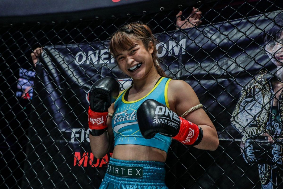 Stamp All Smiles Before Her Match Against Janet Todd