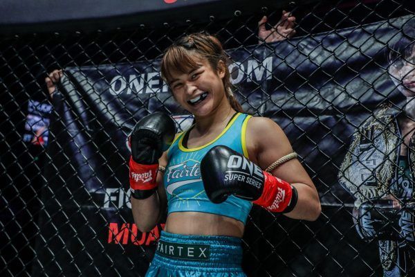 Stamp All Smiles Before Her Match Against Janet Todd