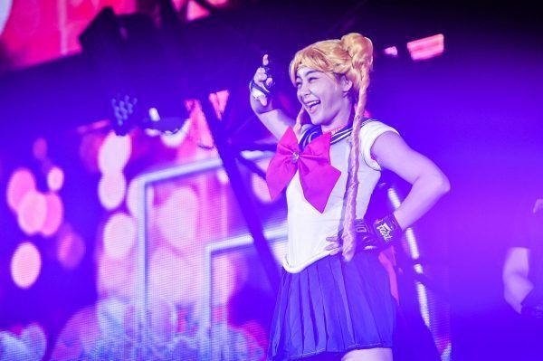 Thai mixed martial artist Rika Ishige greets the crowd as sailor moon