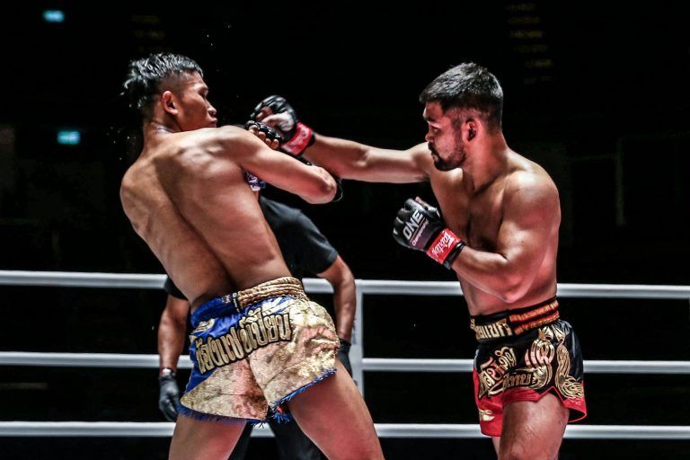 Muay Thai fighter Rodlek PK.Saenchai Muaythaigym lands a left hook on Kulabdam at ONE: A NEW BREED