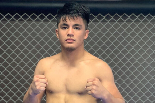 Filipino MMA fighter Jhanlo Sangiao poses at Team Lakay
