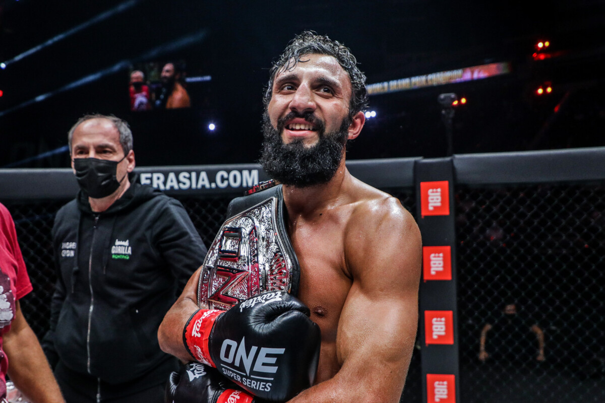 Chingiz Allazov with the ONE Featherweight Kickboxing World Grand Prix silver belt