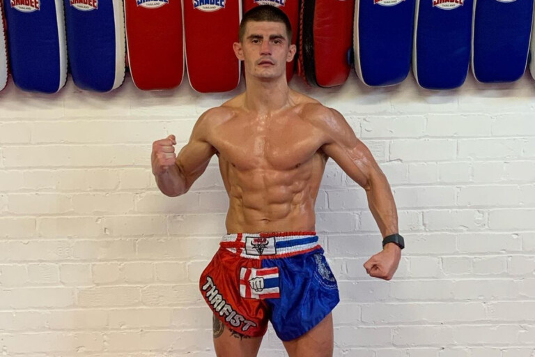 Muay Thai fighter Jacob Smith poses at his gym