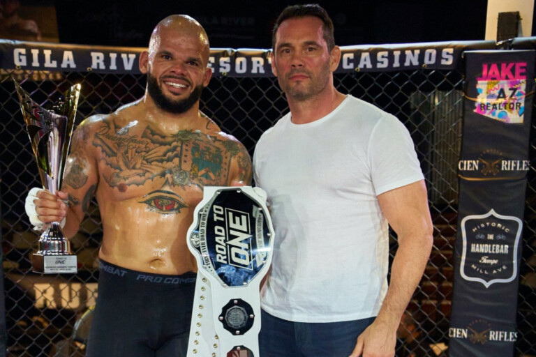 Terrance Jean-Jacques poses with Rich Franklin after RUF 47