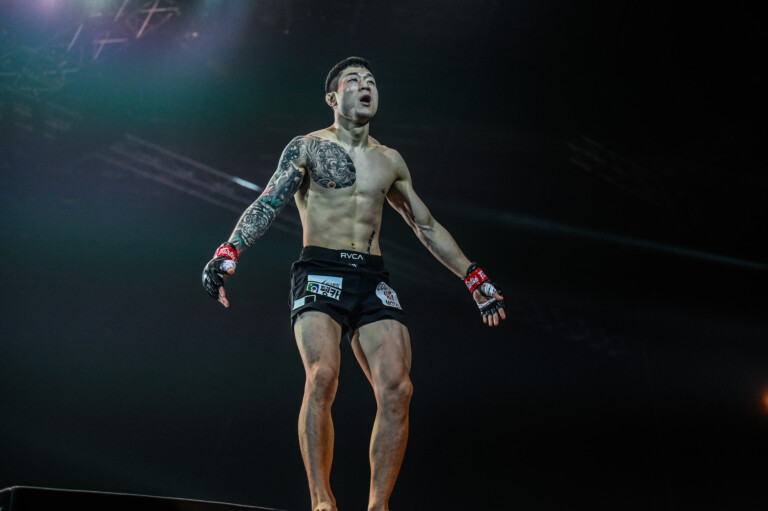Kim Jae Woong stands in the Circle