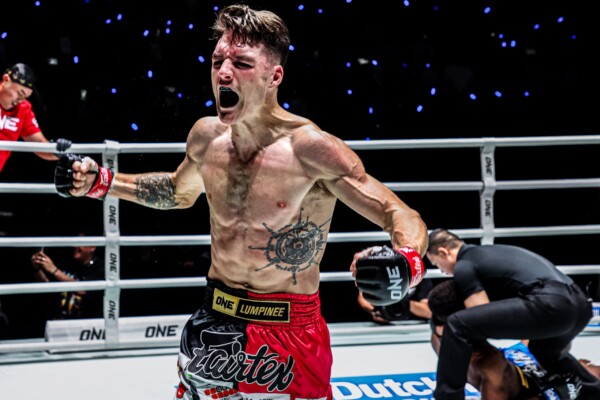 Tyson Harrison celebrates after beating Kendu Irving