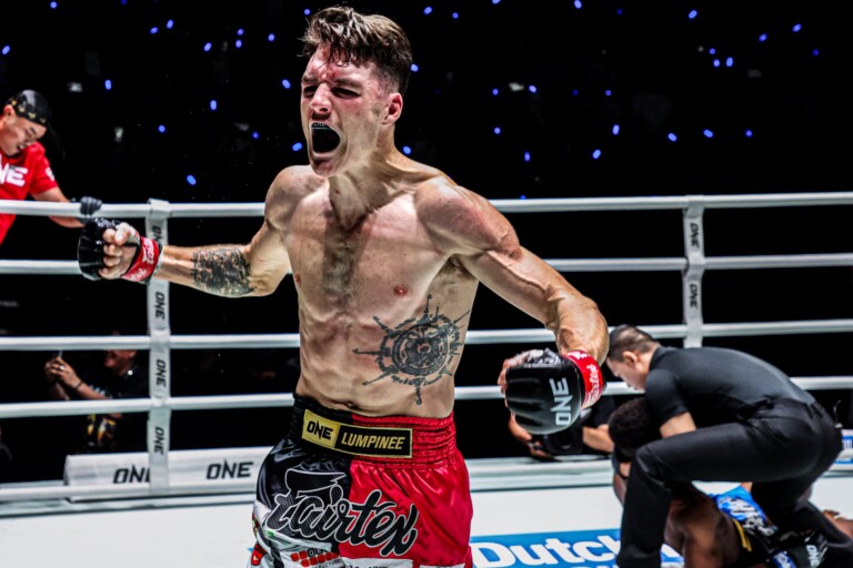 Tyson Harrison celebrates after beating Kendu Irving