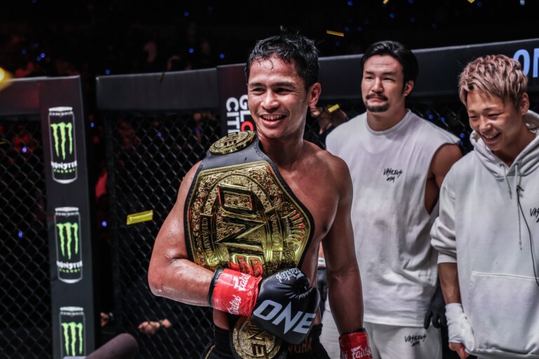 Superbon celebrates after defeating Masaaki Noiri at ONE 173.