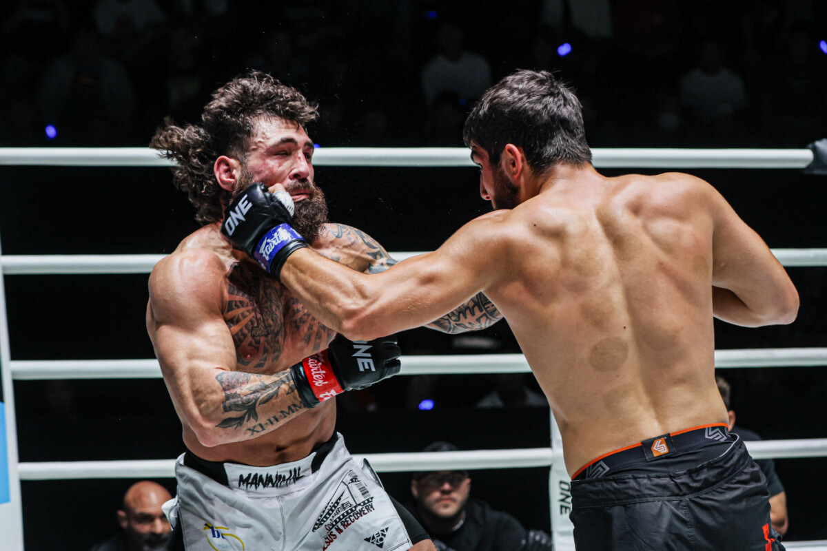 Dzhabir Dzhabrailov hits Chase Mann with a left hand at ONE Fight Night 42