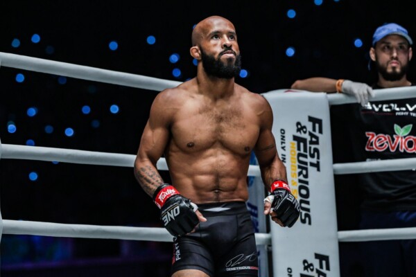 American martial arts star Demetrious Johnson stands in the corner