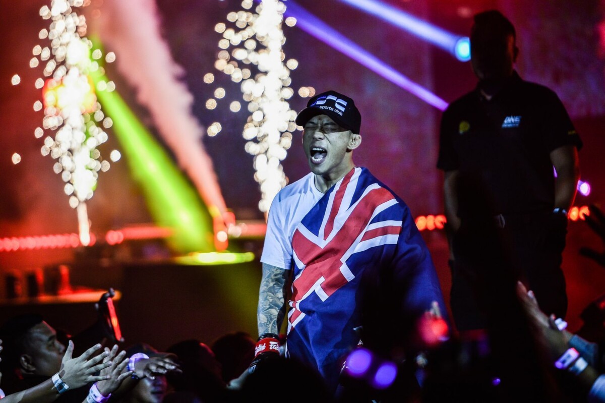 Martin Nguyen shows his excitement on his walk to the ring at ONE: DAWN OF HEROES.