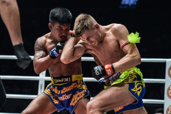Rodtang Jitmuangnon strikes as Jonathan Haggerty blocks at ONE: DAWN OF HEROES.
