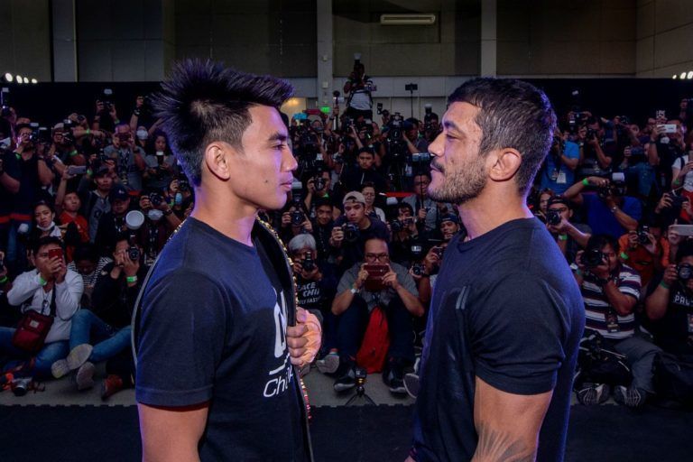 ONE Strawweight World Champion Joshua Pacio faces off with Alex Silva at the ONE: FIRE & FURY Press Conference