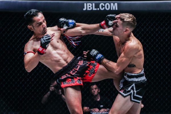 Sam-A Gaiyanghadao exchanges strikes with Rocky Ogden at ONE KING OF THE JUNGLE