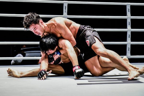 Australia's Brogan Stewart-Ng gets on top of Prach Buapa