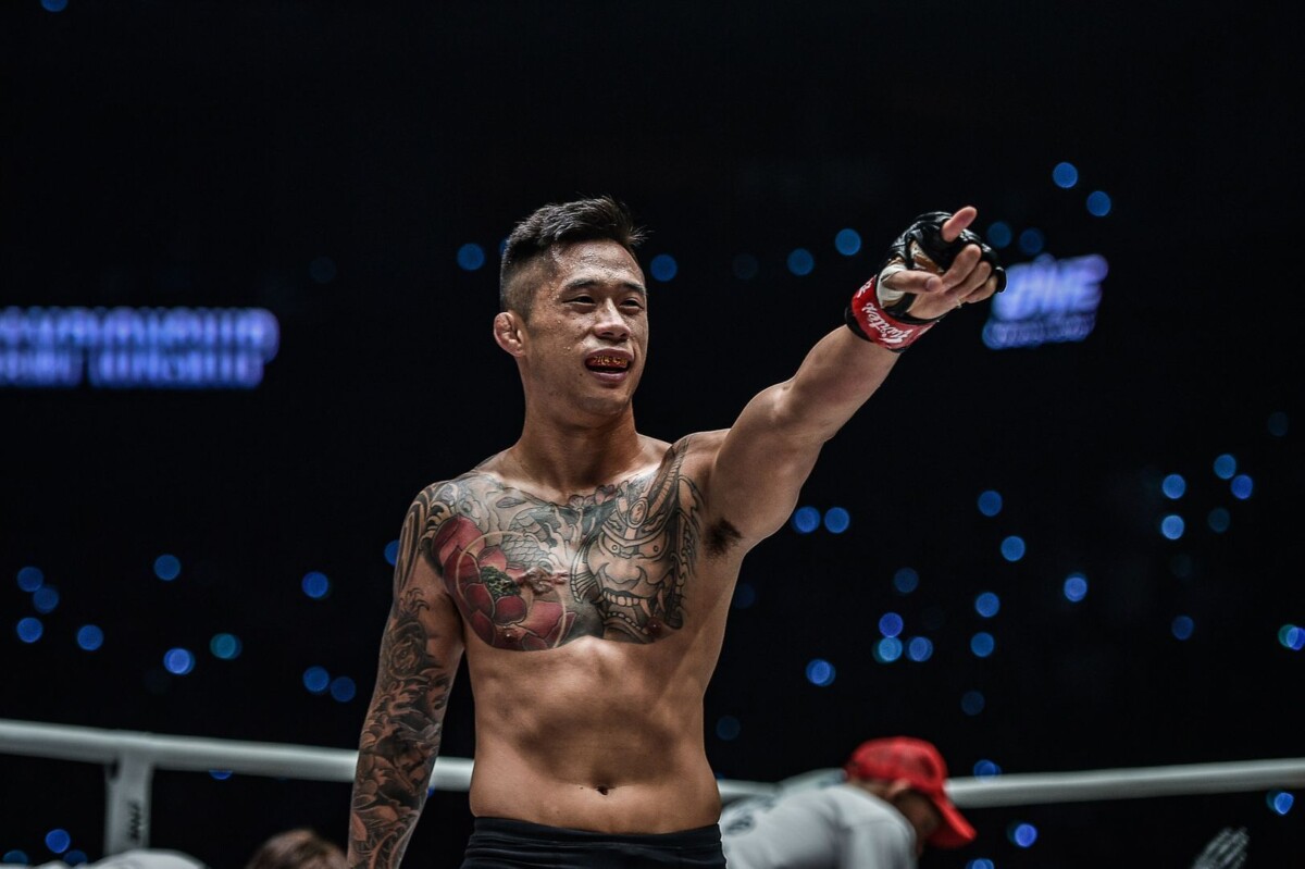 Martin Nguyen celebrates his victory at ONE: DAWN OF HEROES.