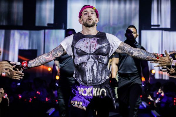 British Muay Thai World Champion Liam Harrison walks to the ring in his punisher shirt