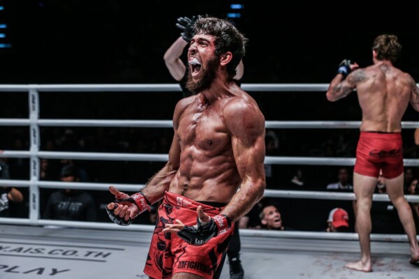 Russian MMA fighter Raimond Magomedaliev celebrates his big victory