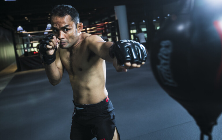 Muay Thai World Champion Dejdamrong Sor Amnuaysirichoke hits the bag