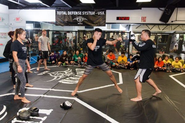 Christian Lee demonstrates a boxing technique at United MMA in Hawaii