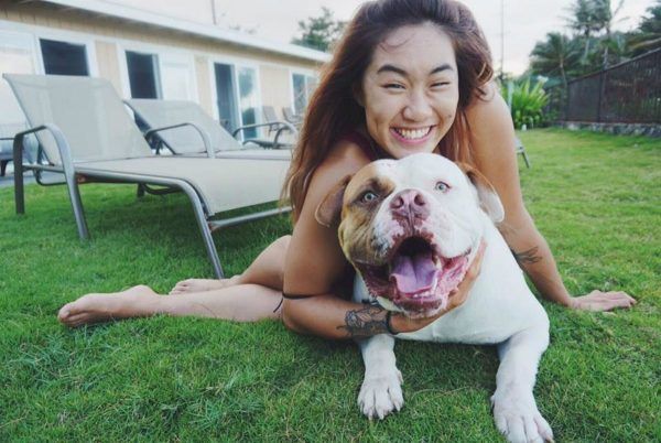 ONE Women's Atomweight World Champion Angela Lee and her puppy, Rocky