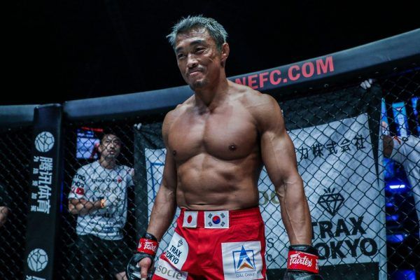 Japanese-Korean mixed martial arts legend Yoshihiro Akiyama smiles