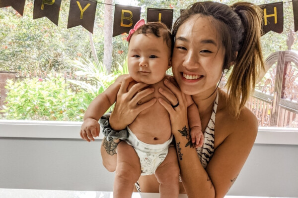 ONE Women's Atomweight World Champion Angela Lee with her daughter