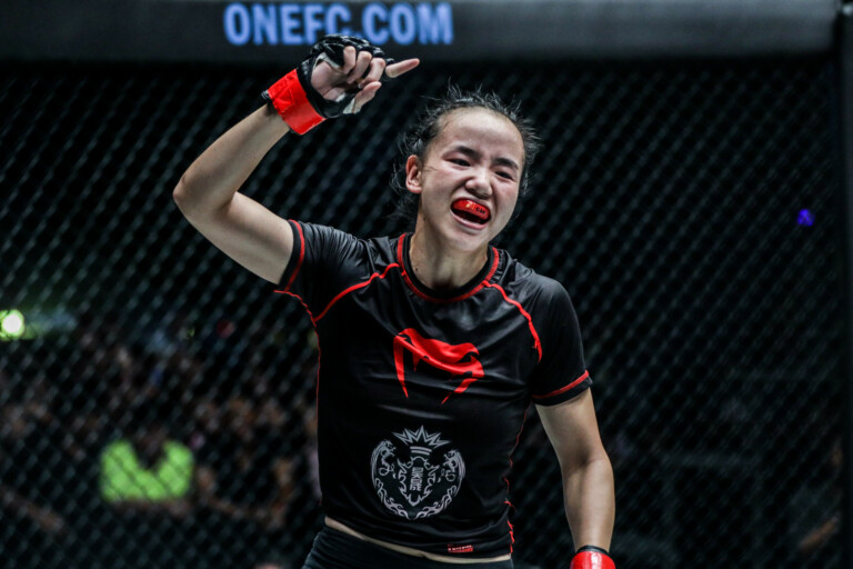 Lin Heqin celebrates a win 768x512
