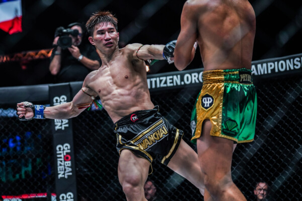 Tawanchai PK.Saenchai throws a left kick