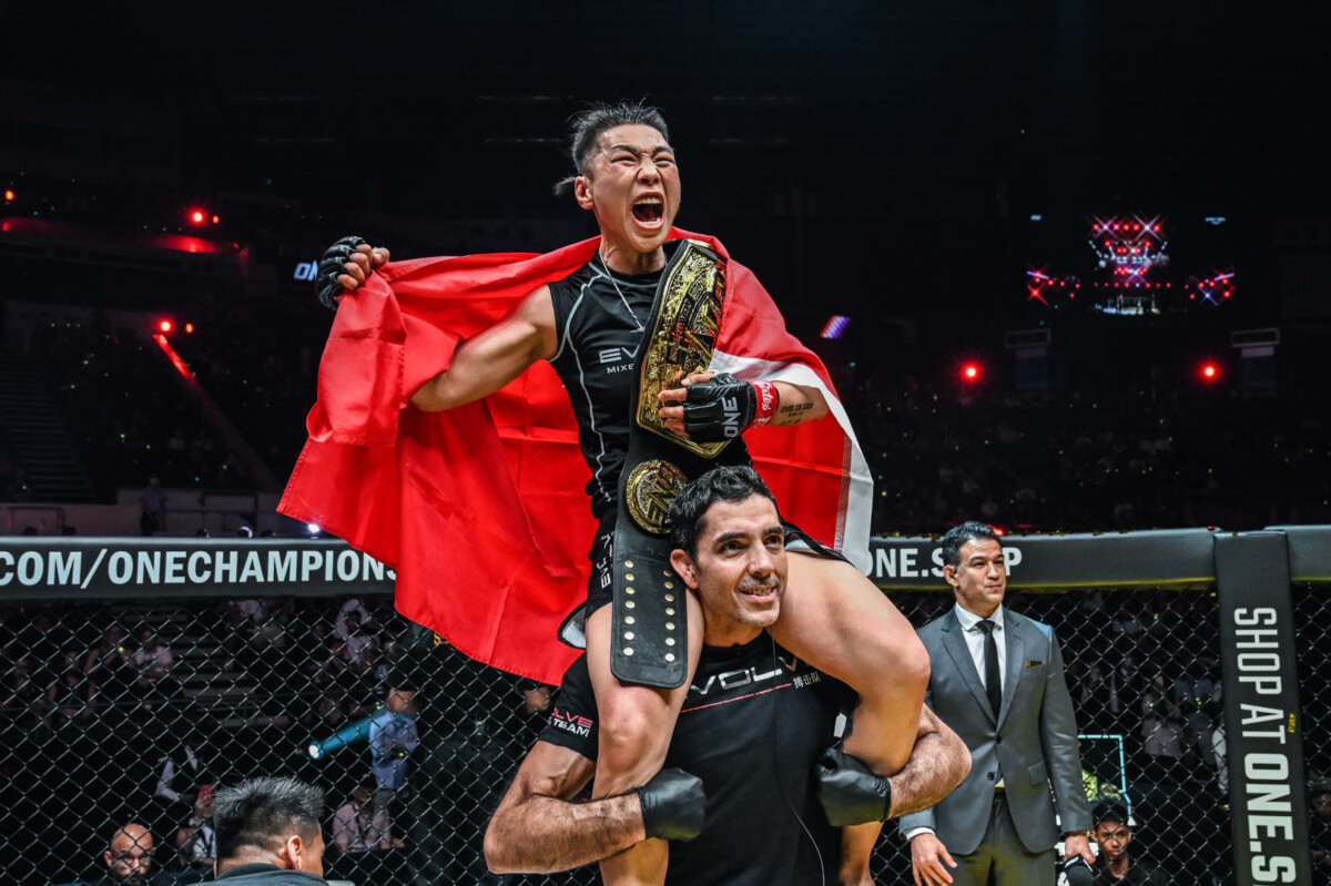 Xiong Jin Nan celebrates her title victory over Angela Lee at ONE Fight Night 2