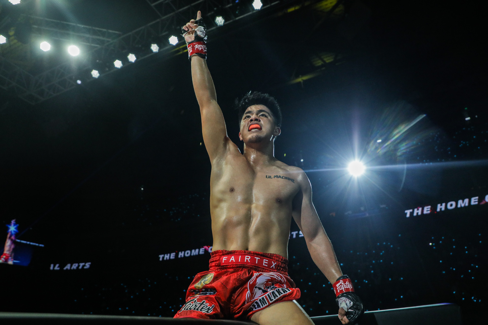 Jhanlo Mark Sangiao celebrates his victory over Anacleto Lauron at ONE 164