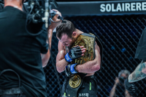 Jarred Brooks embraces the title after win over Joshua Pacio