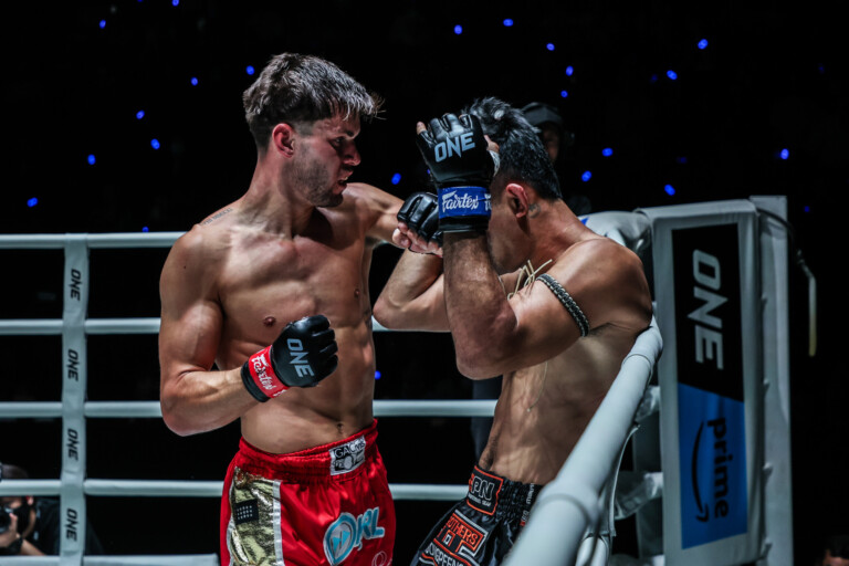 British Muay Thai fighter George Jarvis punches Rungrawee Sitsongpeenong to the head